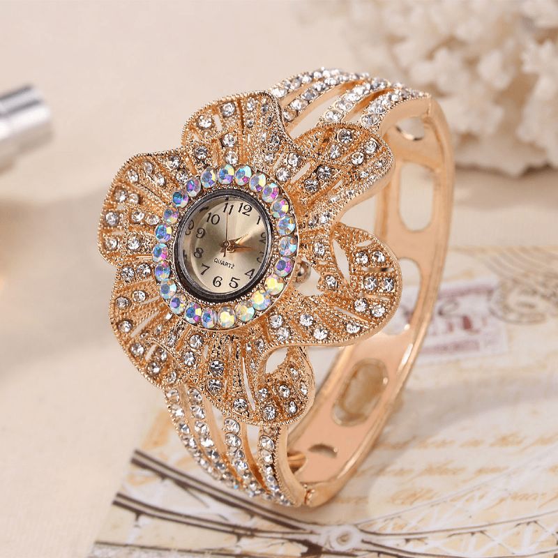 Mode Crystal Flower Shape Dial Hollow Metal Strap Kvinder Quartz ur