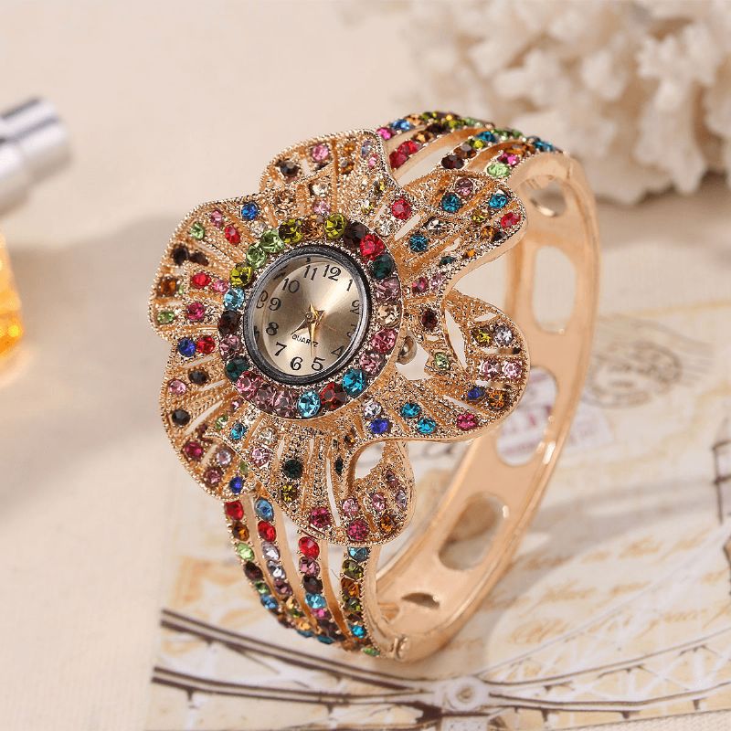 Mode Crystal Flower Shape Dial Hollow Metal Strap Kvinder Quartz ur