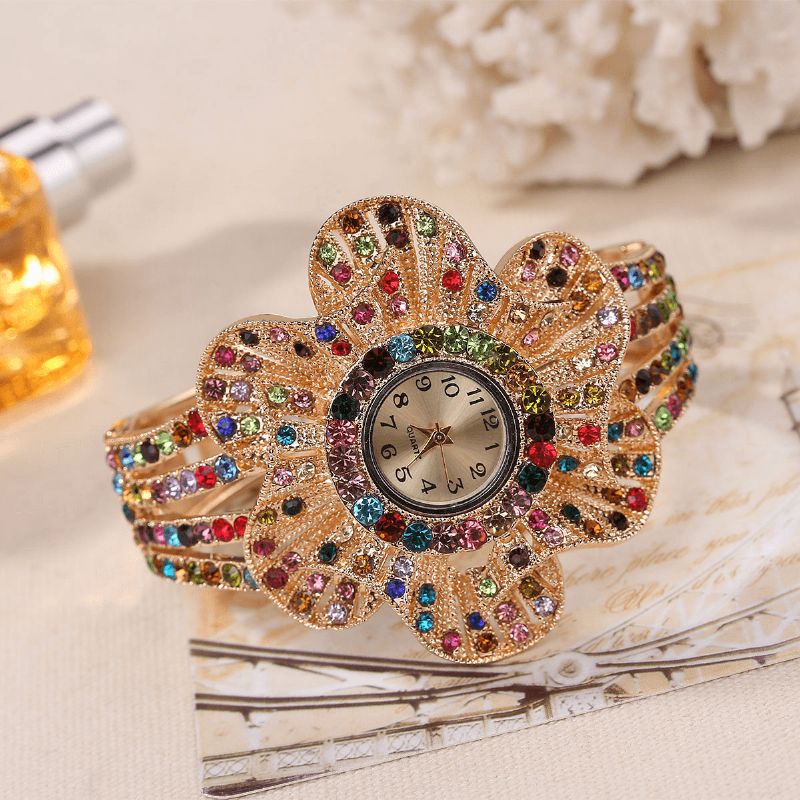 Mode Crystal Flower Shape Dial Hollow Metal Strap Kvinder Quartz ur