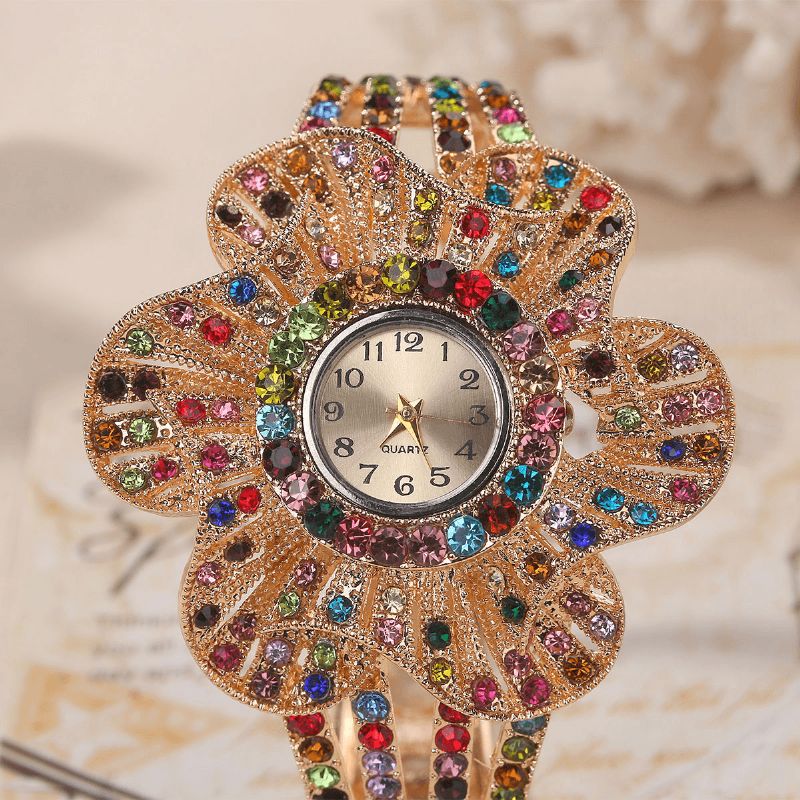 Mode Crystal Flower Shape Dial Hollow Metal Strap Kvinder Quartz ur