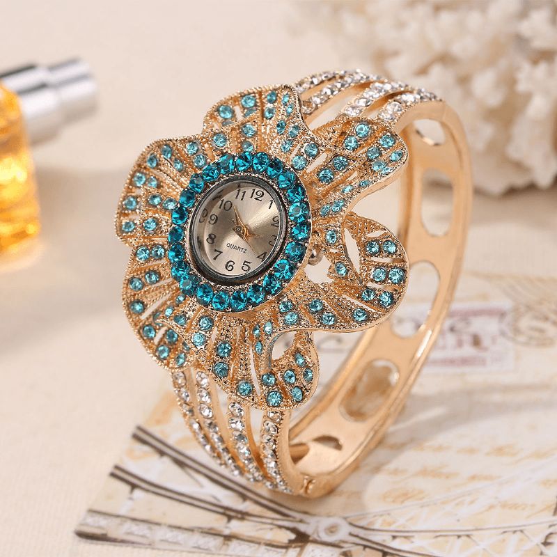 Mode Crystal Flower Shape Dial Hollow Metal Strap Kvinder Quartz ur